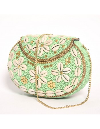 bolso rígido India bolitas verdes y conchas